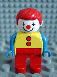 LEGO Duplo Figure, Male Clown, Red Legs, Yellow Top with 2 Buttons, Blue Arms, Red Hair Straight minifigure