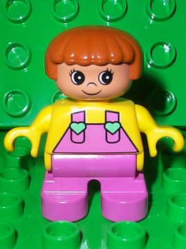 LEGO Duplo Figure, Child Type 2 Girl, Dark Pink Legs, Yellow Top with Dark Pink Overalls and Hearts on Straps minifigure