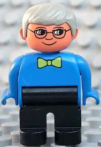 LEGO Duplo Figure, Male, Black Legs, Blue Top with Green Bow Tie, Gray Hair, Glasses minifigure
