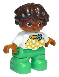 LEGO Duplo Figure Lego Ville, Child Girl, Bright Green Legs, White Top with Yellow Pattern and Blue Bow, Dark Brown Wavy Hair, Magenta Glasses minifigure