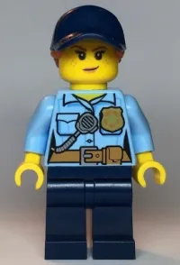LEGO Police - City Officer Female, Bright Light Blue Shirt with Badge and Radio, Dark Blue Legs, Dark Blue Cap with Dark Orange Ponytail, Freckles minifigure