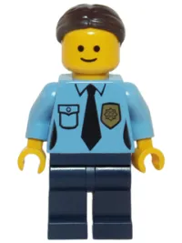 LEGO Police - Female Officer, Dark Brown Hair with Bun minifigure